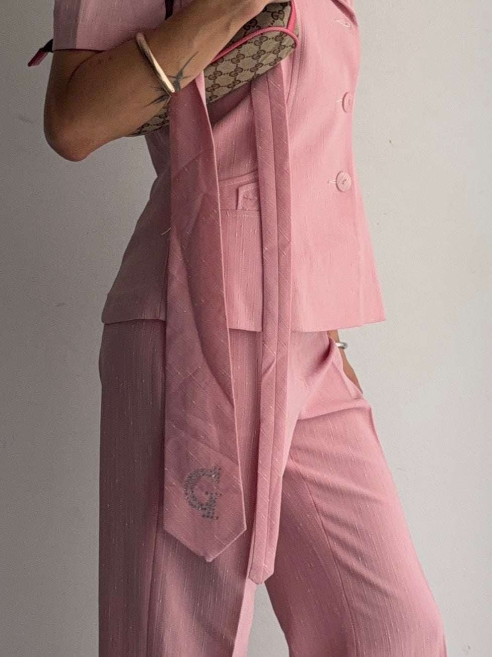 suit jacket pants tie and skirt