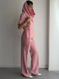 suit jacket pants tie and skirt