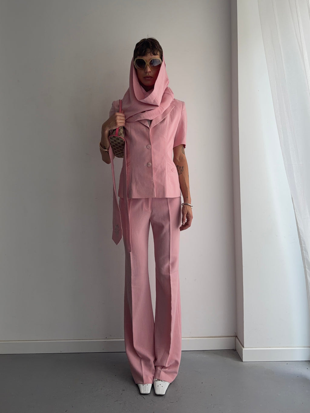 suit jacket pants tie and skirt
