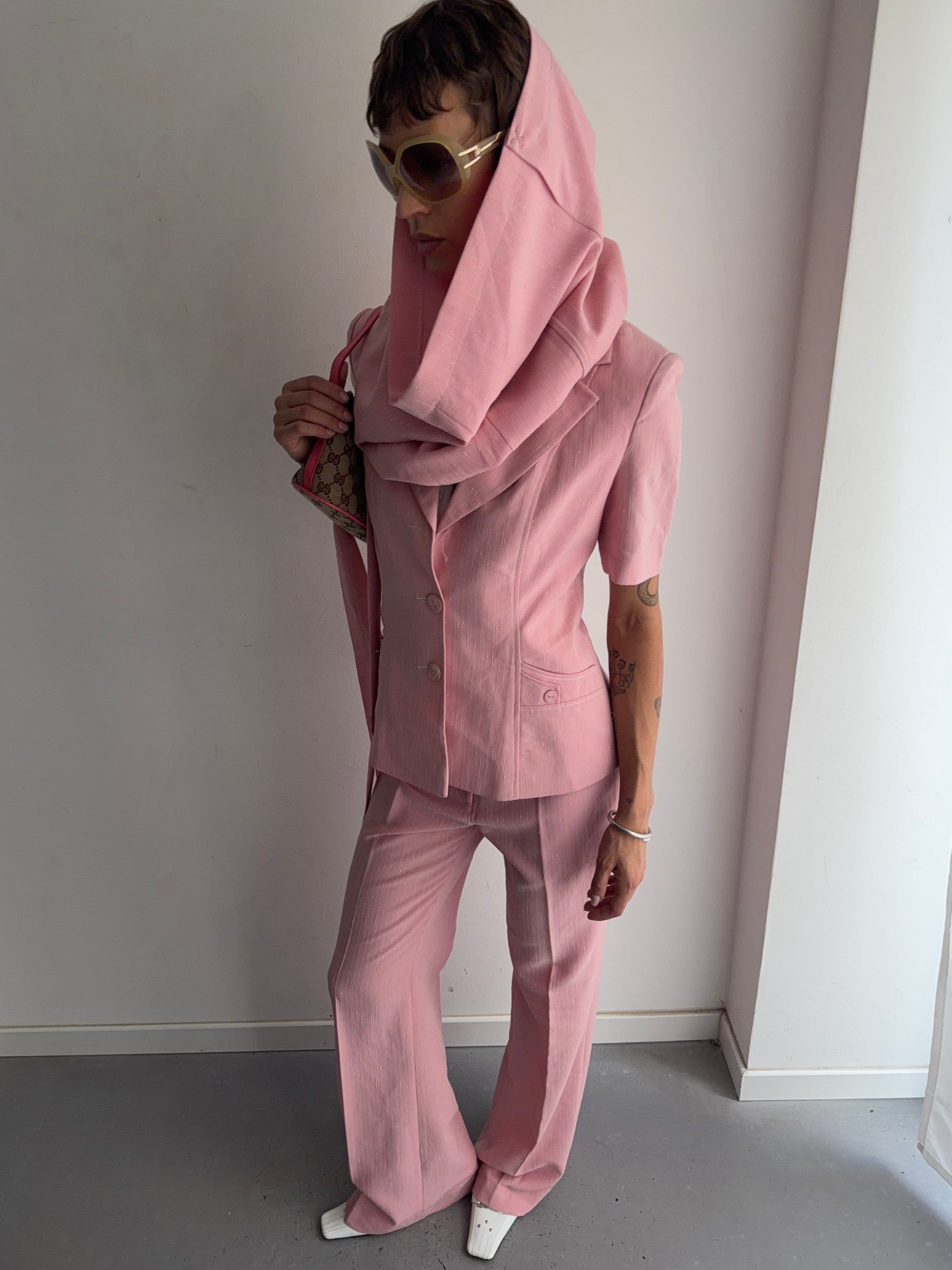 suit jacket pants tie and skirt