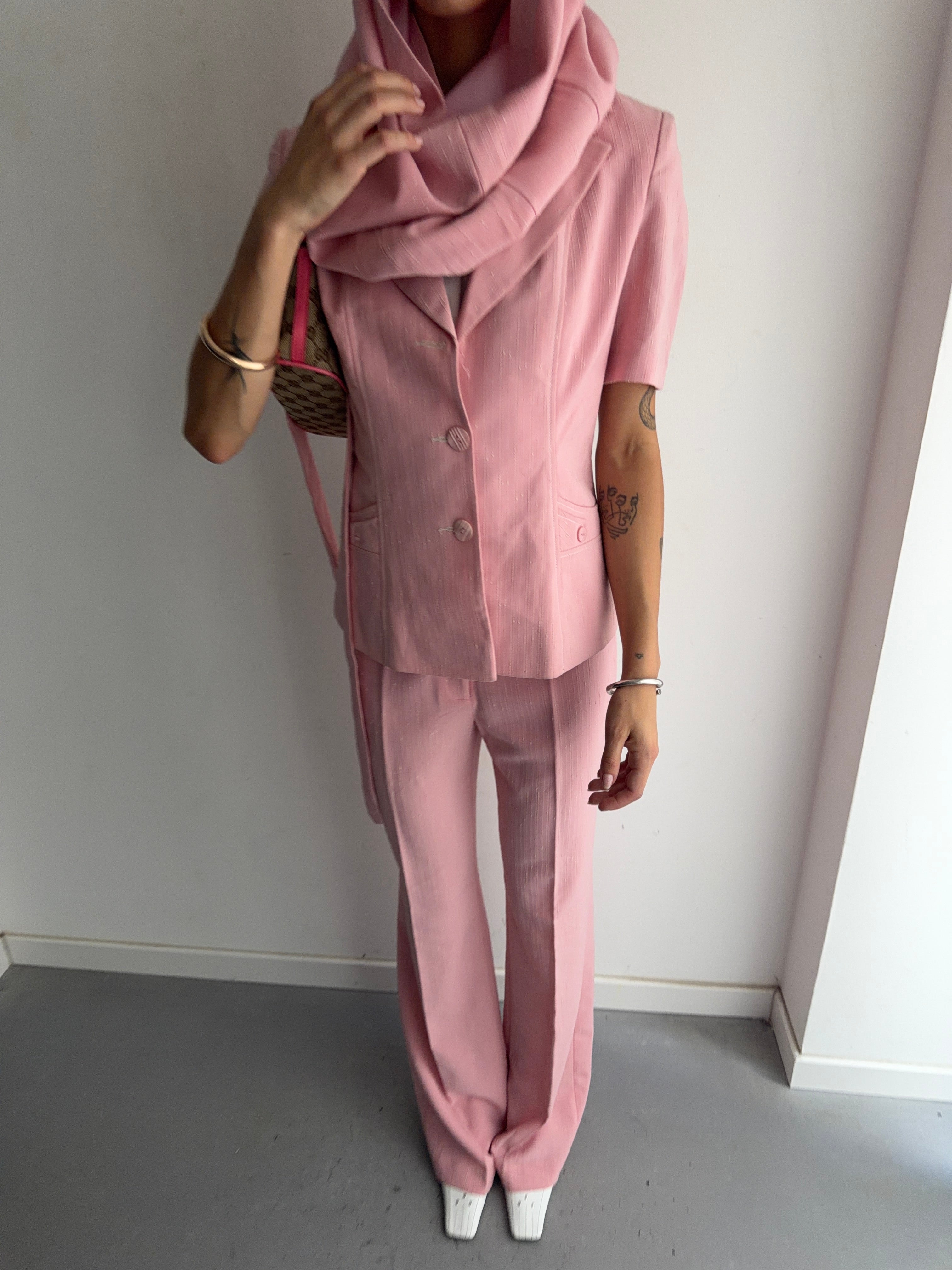suit jacket pants tie and skirt