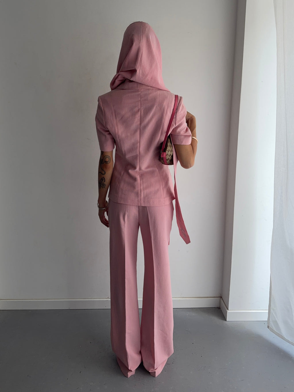 suit jacket pants tie and skirt
